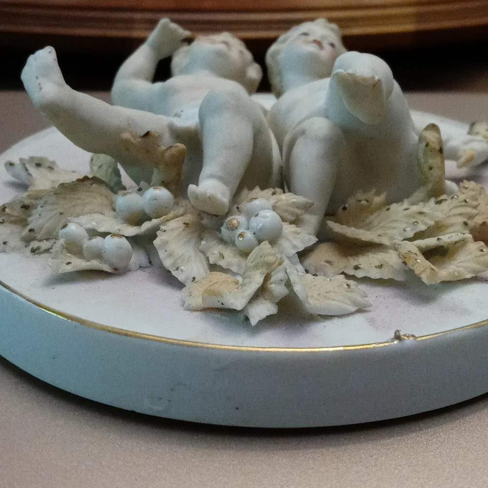 Antique cherub wall plaque